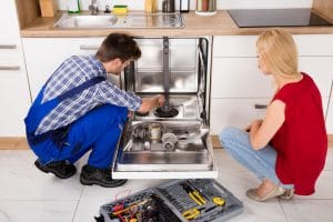 Plumber fixing leaking dishwasher - Plumber Gladstone