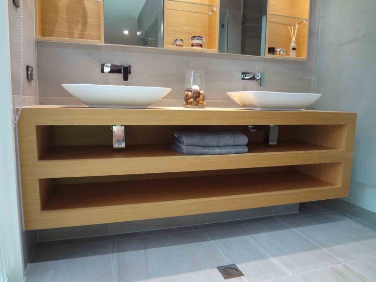 Bathroom renovations with wooden counter by gladstone plumbers
