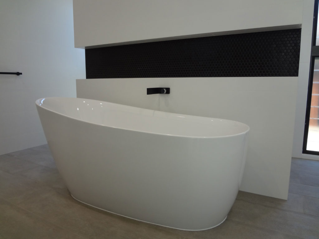 New Bathroom Remodel with black fitting & bathtub - Plumbing Gladstone